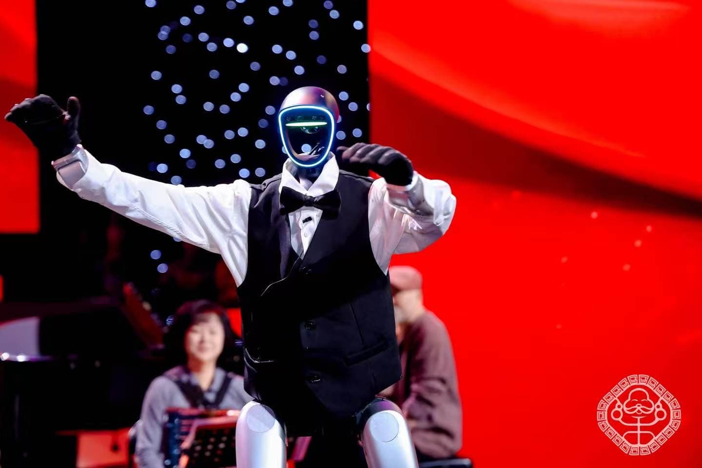 Close-up of robot performing a dance move on stage